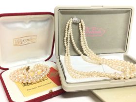 Simulated pearl necklaces including Majorica and n