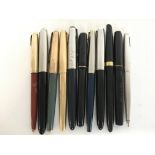 A collection of vintage parker 51s and 61s pens. P
