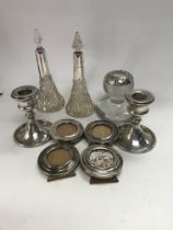 A Collection of silver including two perfume bottl