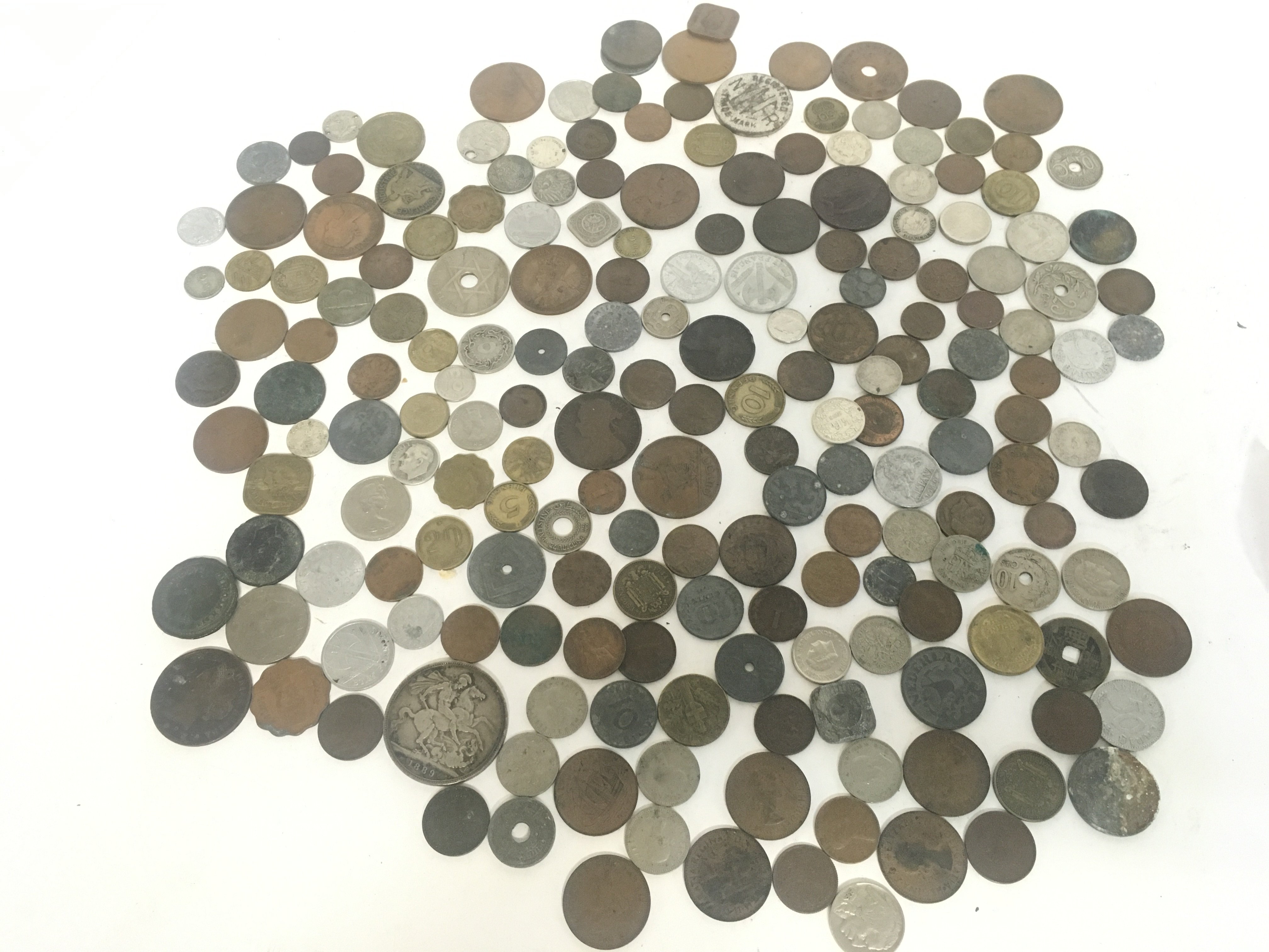 A mixed collection of GB and world coins including