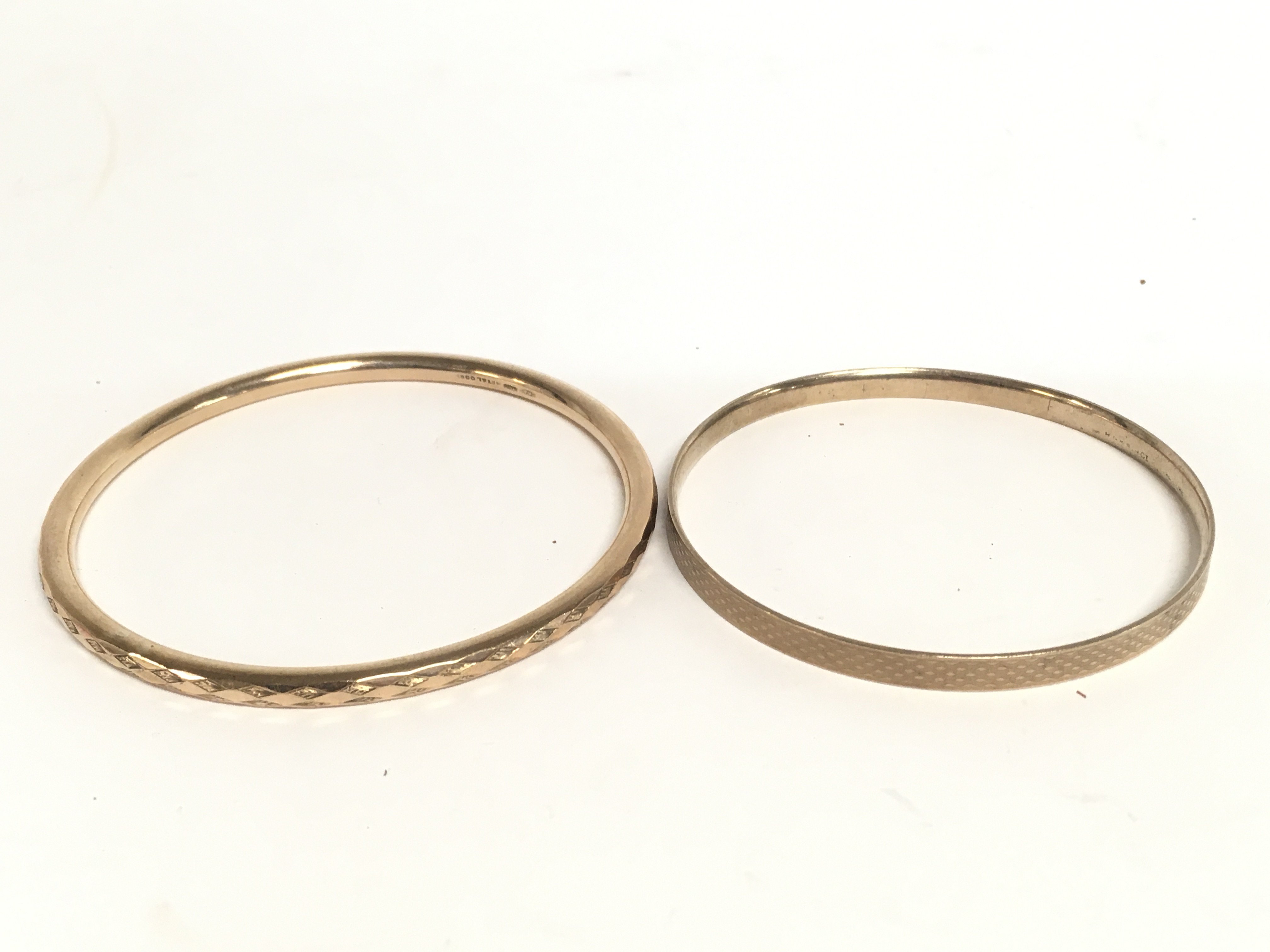 9ct metal core armlet bangles , 69g. Postage categ