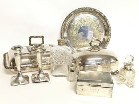 A collection of silver plated dishes and silver ha