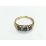 An 18ct gold, sapphire and diamond ring, approx 3g