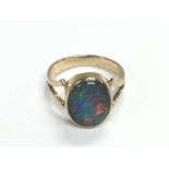 A 9ct gold ring set with an opal, approx 3g and ap