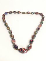 A Venetian murano millehore bead necklace. Postage
