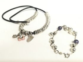 A links of London silver necklace and bracelet. Po
