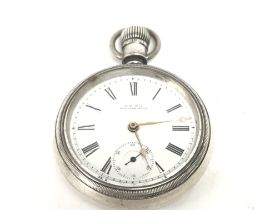 A.W.W co pocket watch. Winds and runs. Approx 55mm