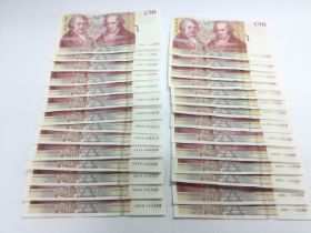 A collection of twenty eight uncirculated Â£50 GB