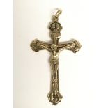 A 9ct gold cross pendant. Approximately 6cm long.