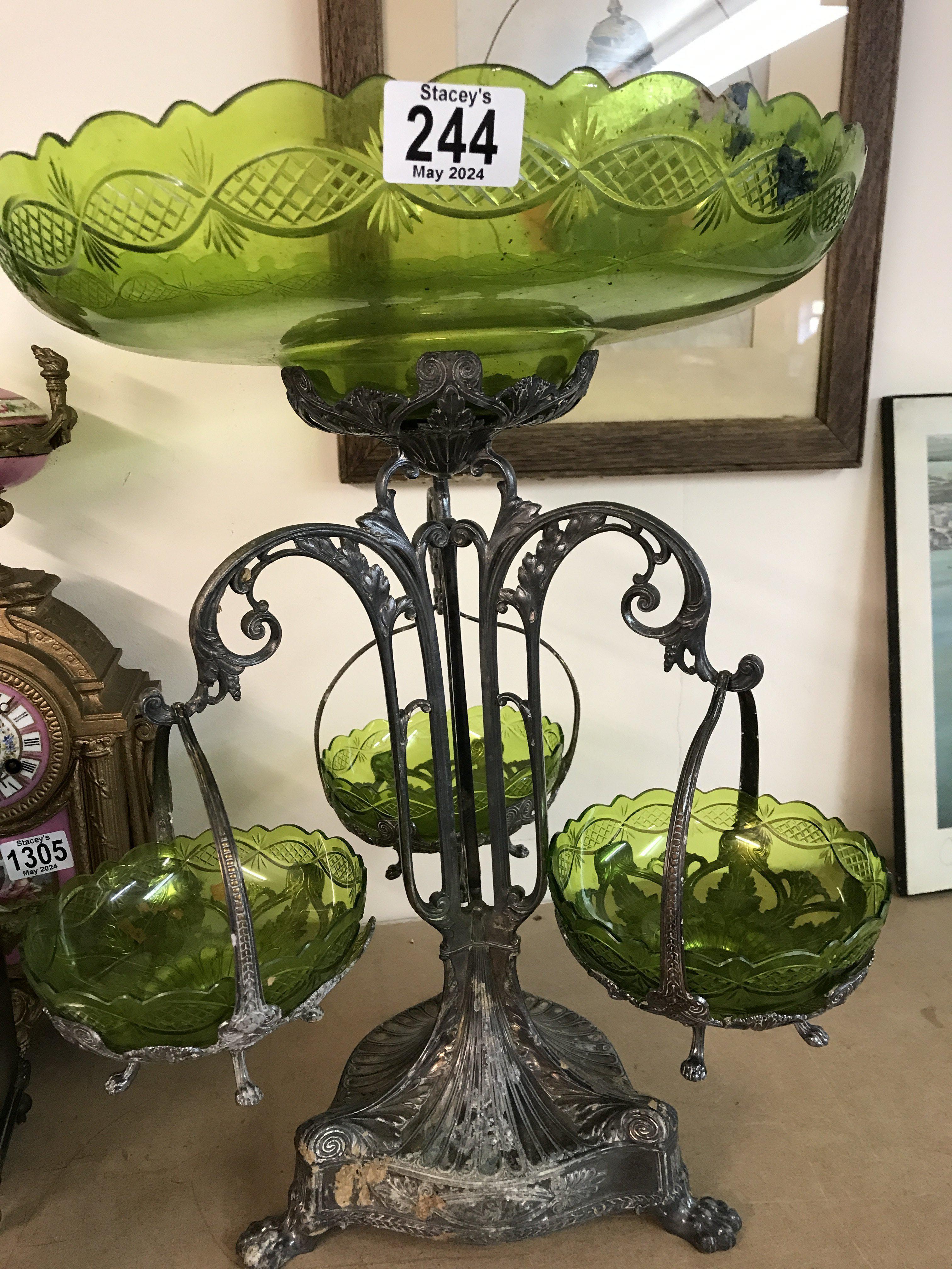 A silver plated Epergne with central green glass b