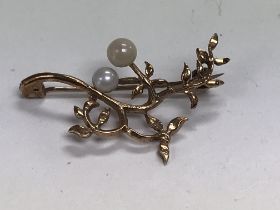 A Edwardian 9 ct gold brooch inset with seed Pearl