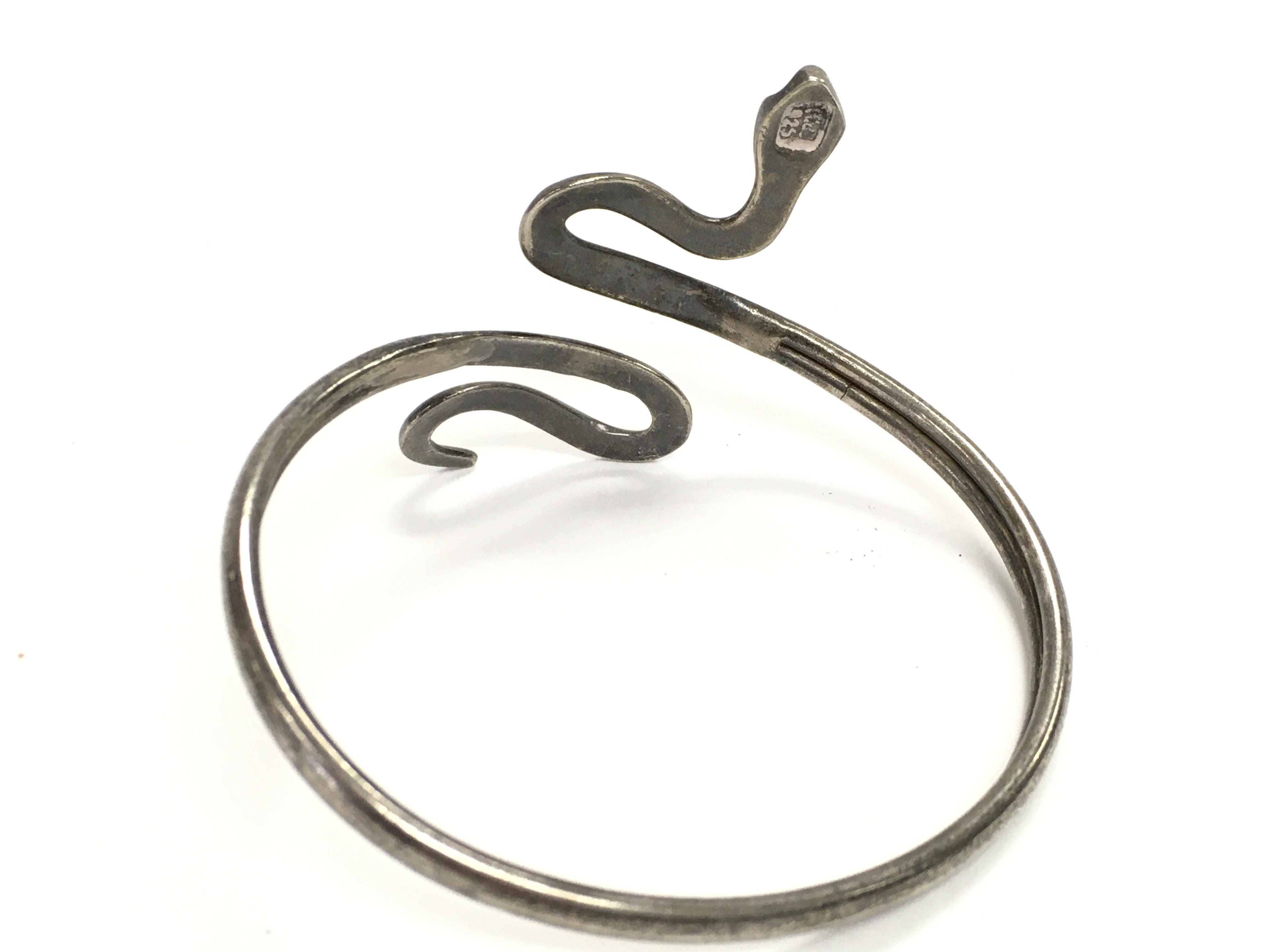 A silver snake bangle. Approx 7cm diameter and 17. - Image 2 of 2