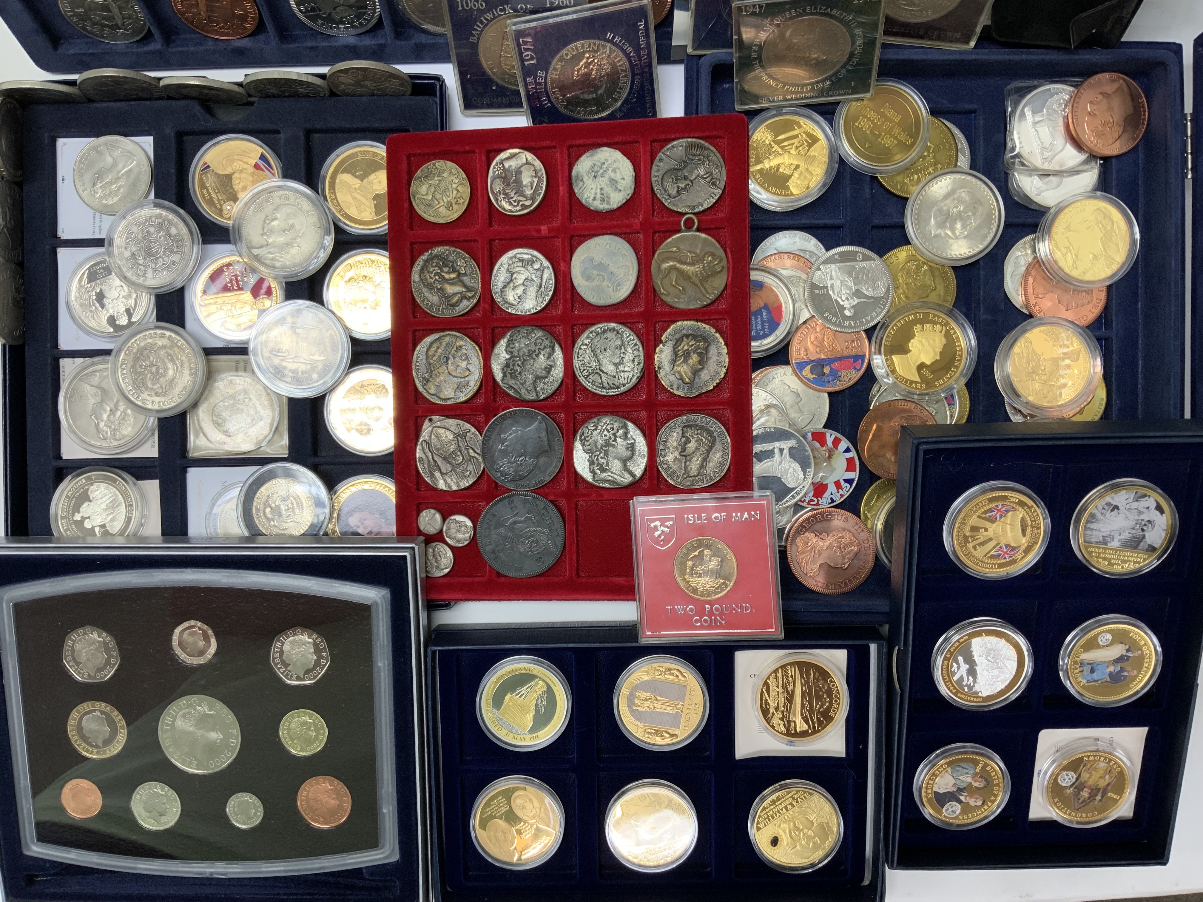 A large collection of commemorative and replica co
