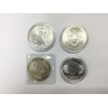 Four American 1oz silver dollars. Shipping categor