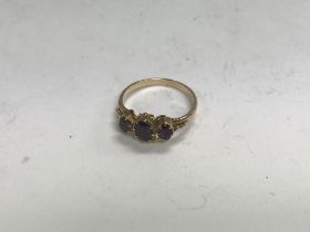 A 9ct gold garnet set ring. Approx 3.21 grams, siz