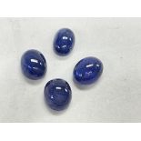 Four cabochon sapphires totalling 15.11ct. Postage