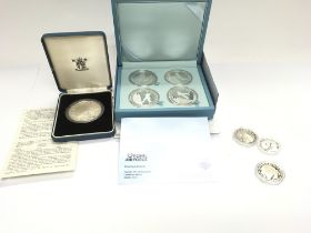 A silver proof Battle of Britain medallion and oth
