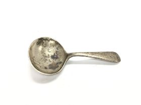 A silver caddy spoon. 17.48g and 8cm