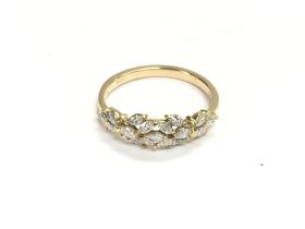 An 18ct gold ring set with diamonds. Size R and 3.