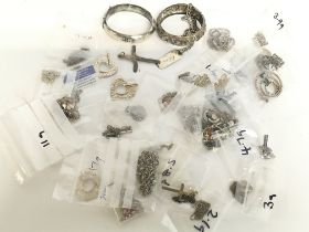 A collection of silver jewellery including bangles