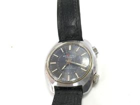 A gents Memocall wristwatch. Approx 36mm case with