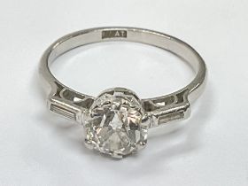 A platinum old brilliant cut solitaire ring with b