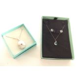 Silver locket and chain, aquamarine stone set silv