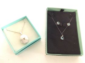 Silver locket and chain, aquamarine stone set silv