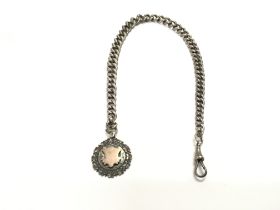 A graduated silver albert chain and fob. 62.20g an