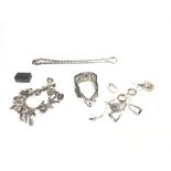 A collection of assorted silver items including ch