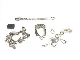 A collection of assorted silver items including ch
