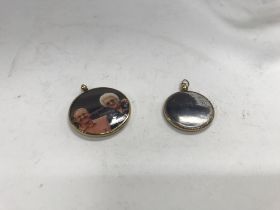 Two 9ct gold frame photo lockets.