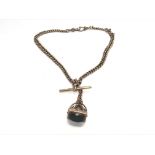 A 9ct gold Albert chain and blood stone fob. 44.85
