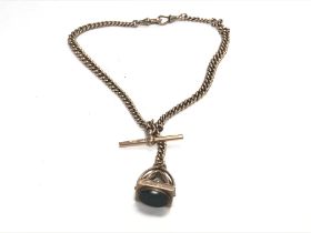 A 9ct gold Albert chain and blood stone fob. 44.85