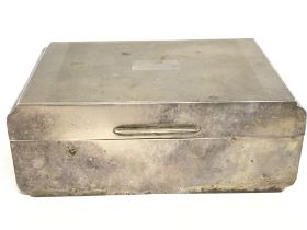 A hallmarked silver cigarette box dimensions 9x13.