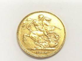 A 1886 full gold sovereign. Melbourne mint. Postag