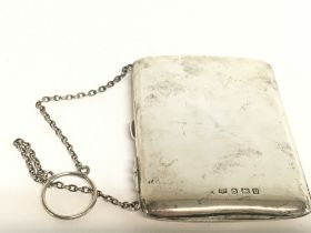 A silver hallmarked card case on chain , 101g. Pos
