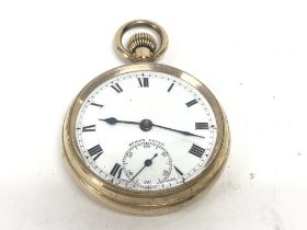 A gold plated pocket watch. 50mm winds and runs. P