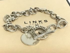 A boxed links of London silver bracelet. Postage c