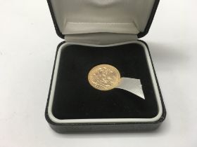 A 2000 Millennium half sovereign. (A)