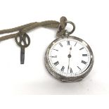 A silver pocket watch. Winds and runs. Approx 36mm