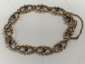 A Edwardian 15 ct gold bracelet inset with seed pe