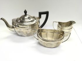 A three piece silver tea set with Birmingham hallm
