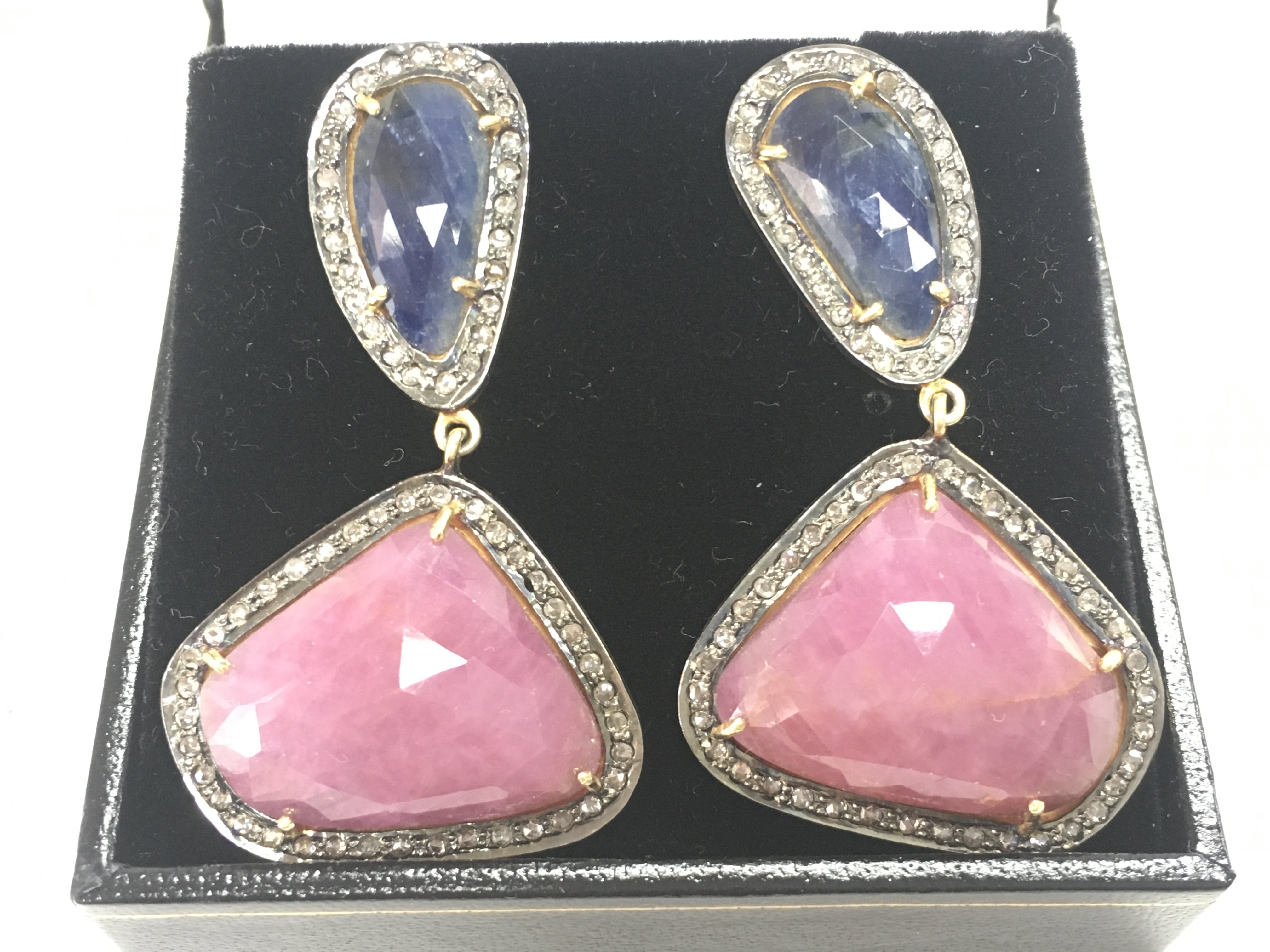 Pair of unusual drop earrings set with large, mixe