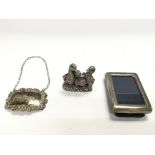 Three silver items including a small silver frame