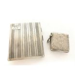 A hallmarked silver cigarette case and vesta. Post