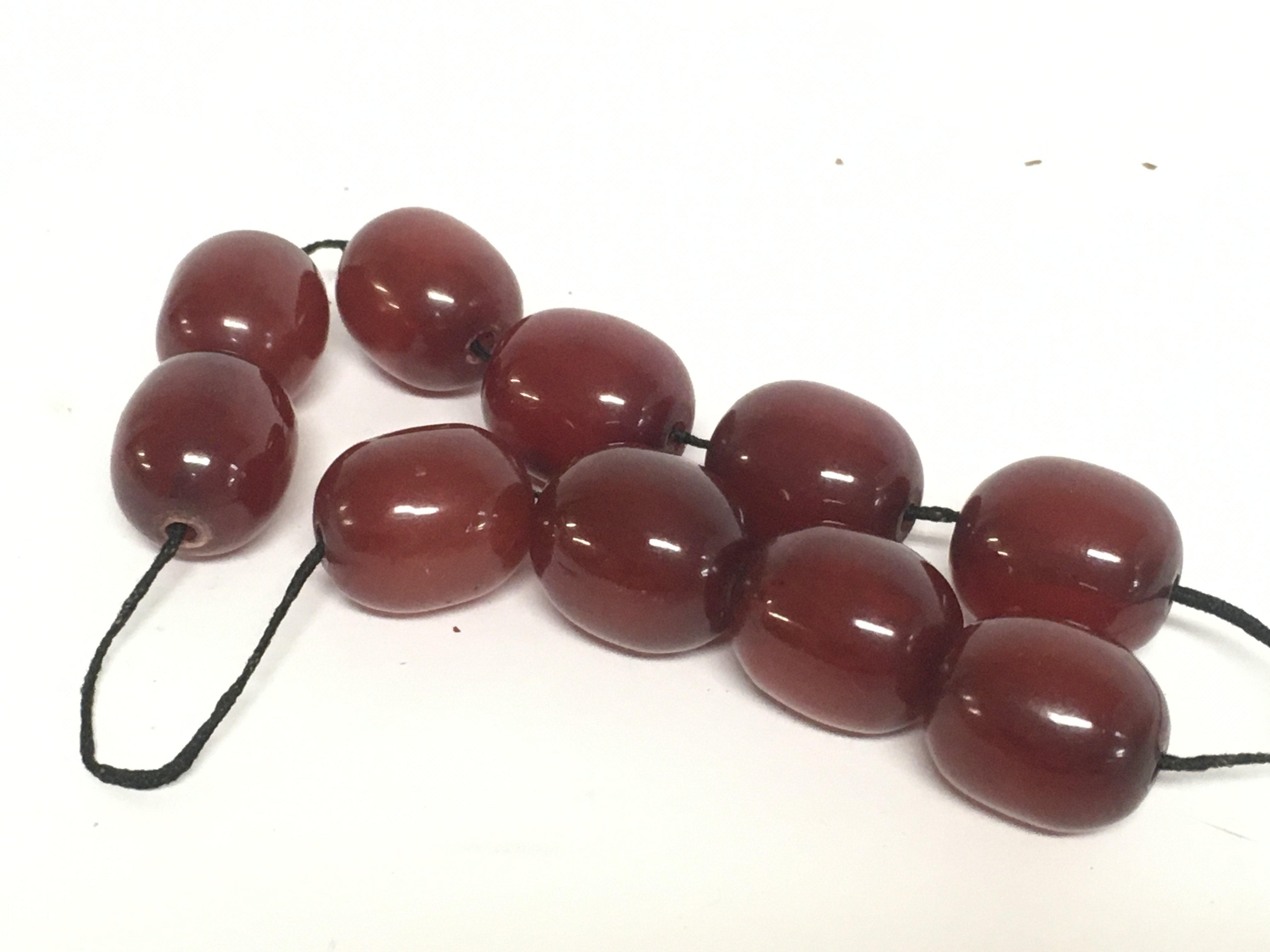 Cherry amber beads, 44g in total. Postage category