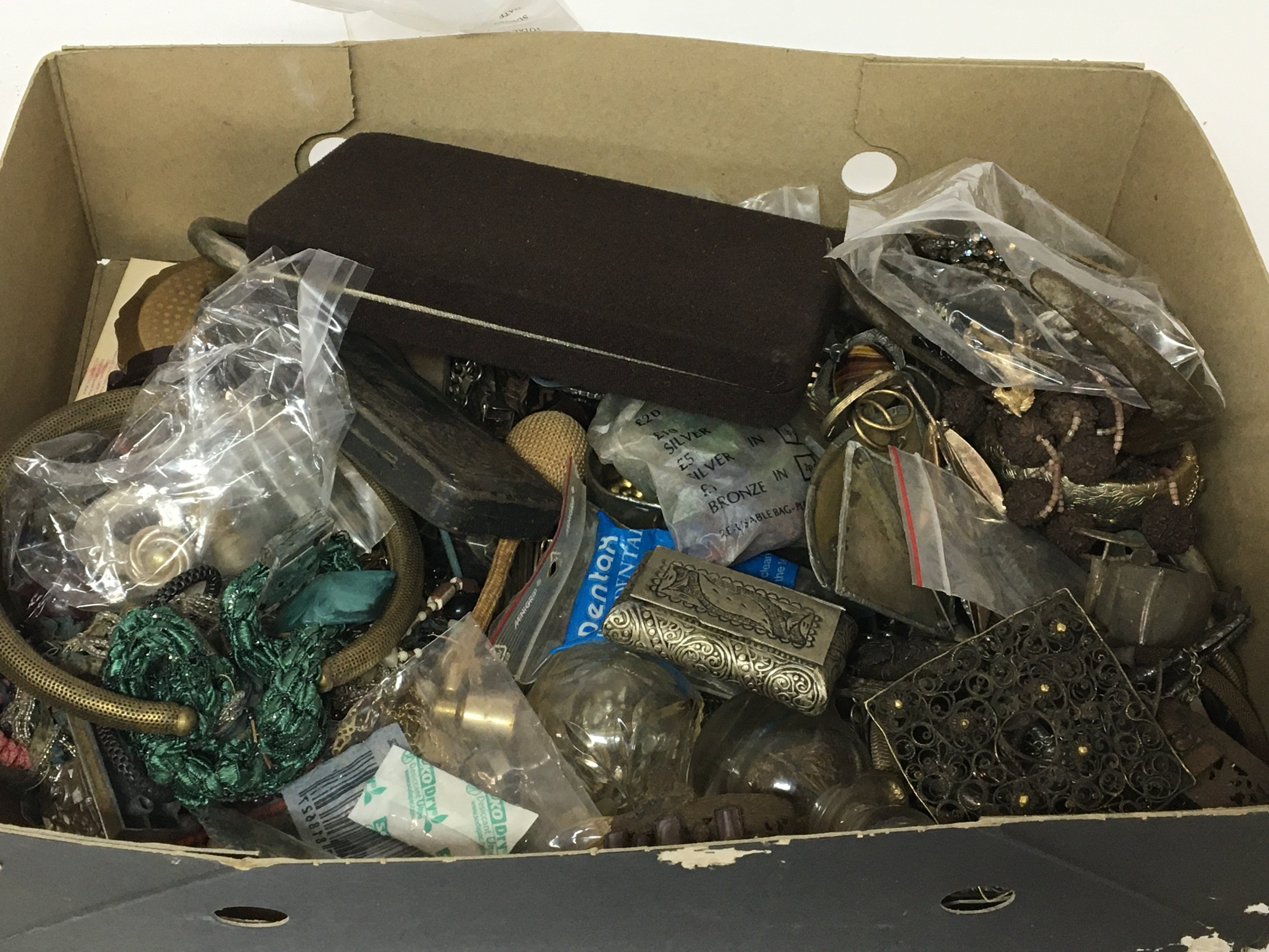 A box containing costume jewellery including filig