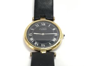 A must de Cartier silver gilt wristwatch. Approx 2