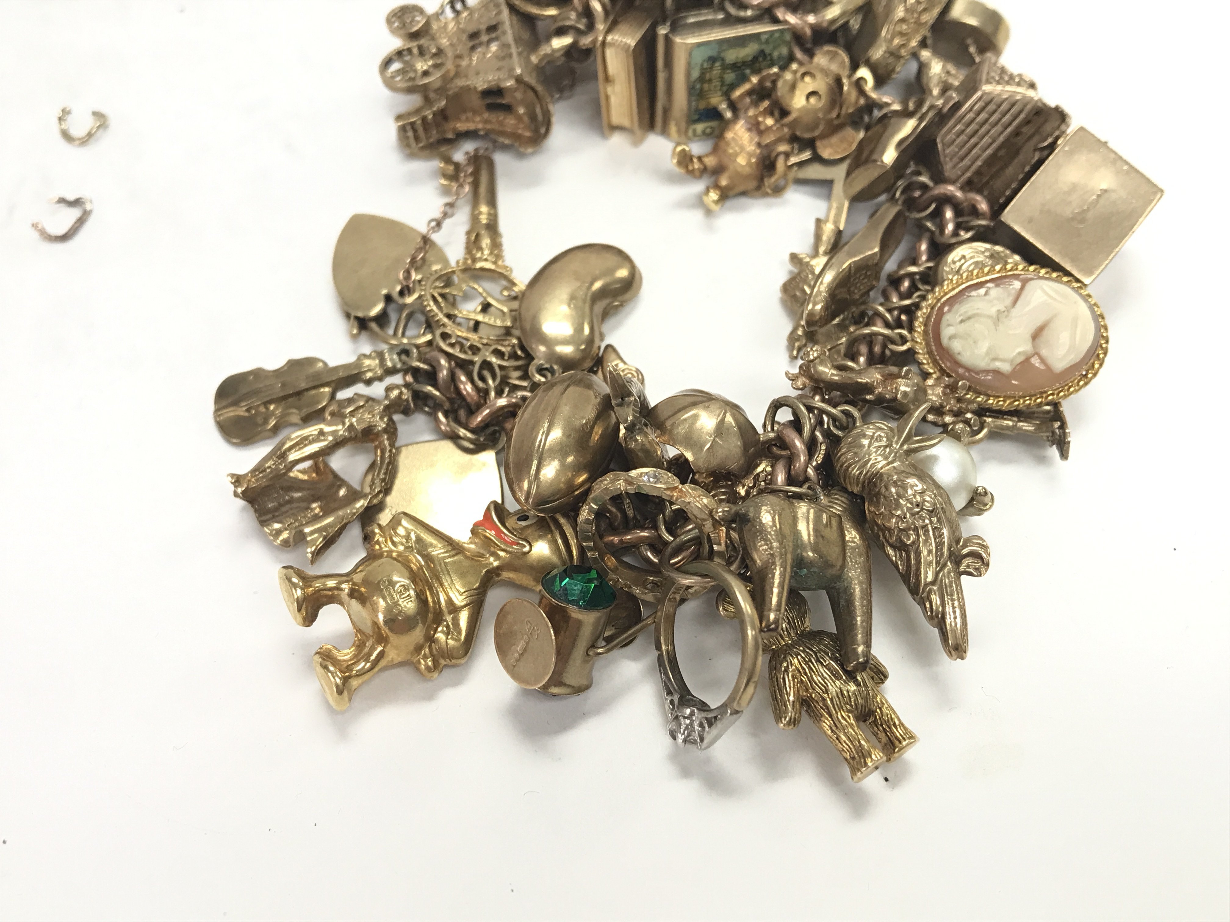 A heavy 9ct gold charm bracelet set with a large n - Image 2 of 3